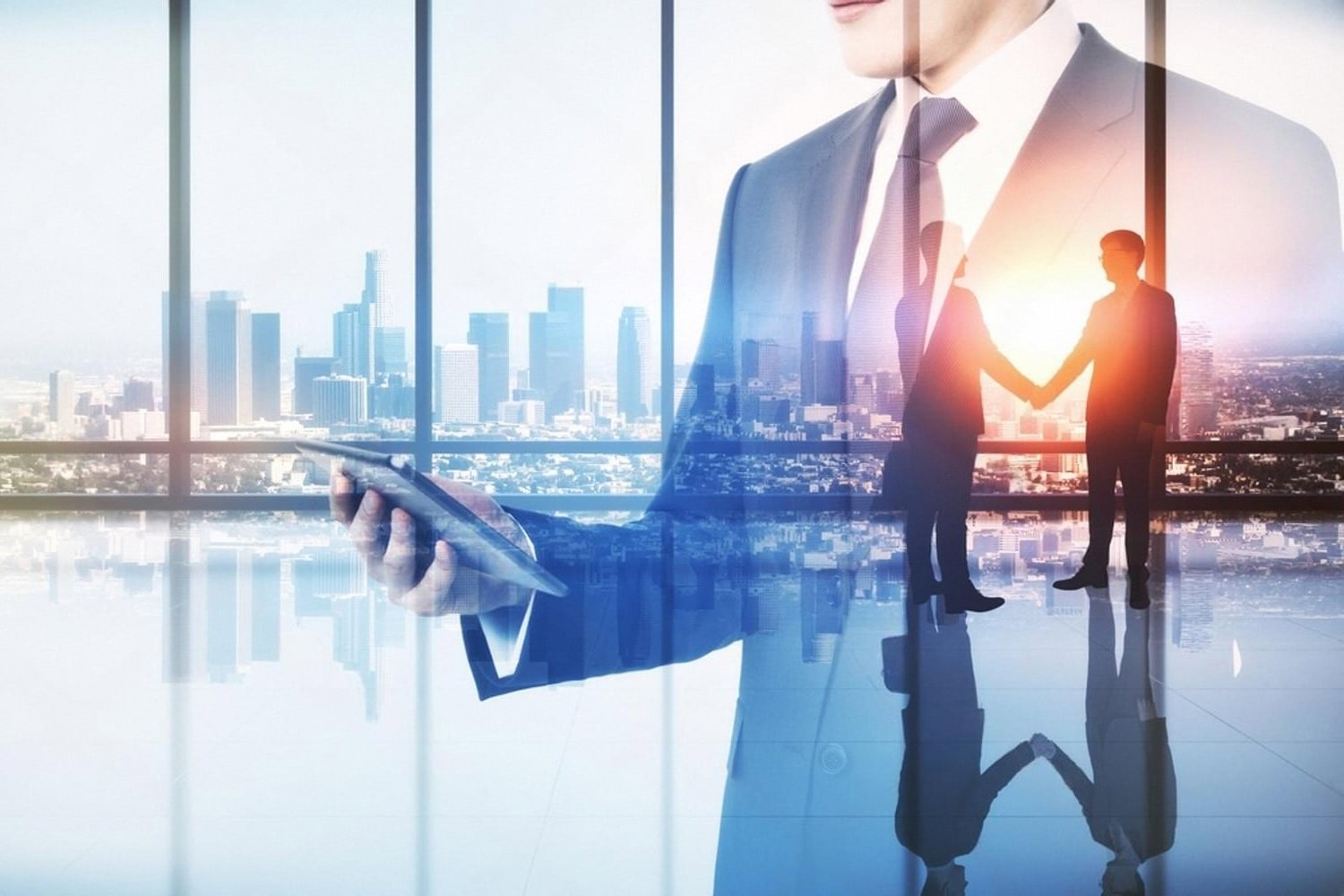 Businessmen shaking hands with Dubai skyline overlay representing a real estate rental agreement