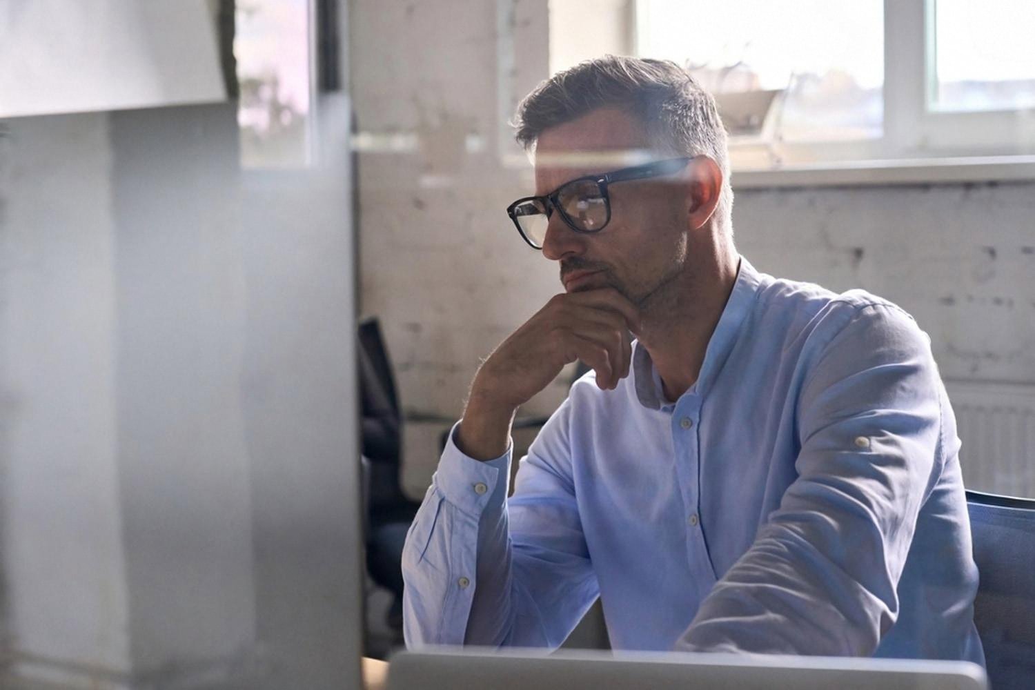 Rental equipment business owner in Dubai reviewing bookings on a laptop